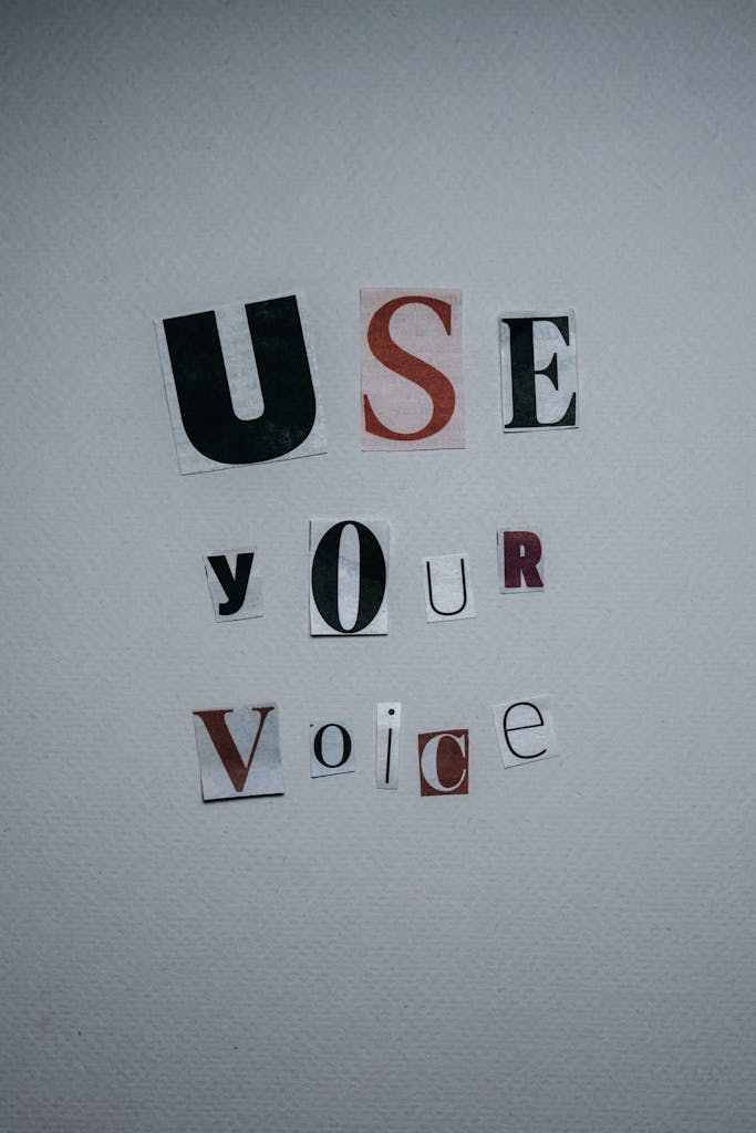 Inspirational wall text ‘Use Your Voice’ symbolizing voice confidence and coaching with The Working Voice